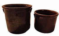 Both crocks side by side showing size difference and side handles