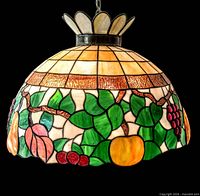 Full view of dome stained glass pendant showing crown and chain