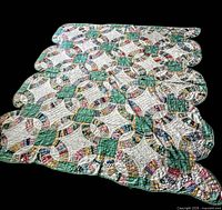 Full view of vintage patchwork double wedding ring quilt