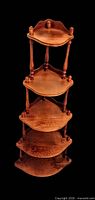 Full front view of five-tier oak corner shelf