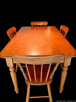 top view of table with chairs showing overall style and finish