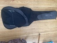 Front view of Ritter guitar gig bag showing padded design and external zipper pockets