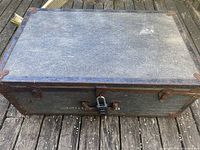 Top view of the fibreglass toolbox showing wear and textured surface.