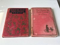 Front view of When We Were Very Young and The House at Pooh Corner, showing the books' covers and condition.