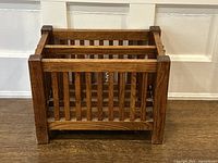 Front view of oak magazine rack