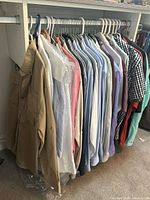 Rack view showing all 17 shirts on hangers