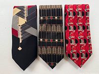 Front view of three Frank Lloyd Wright inspired silk ties with Art Deco patterns, showing all designs and colors.