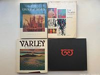Four Canadian art hardcover books laid out flat, showing covers, dust jackets visible with wear
