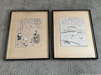 Both framed Asian woodblock prints shown side by side on carpet. Mats with beige tone, black frames. Some water staining on mat of right print.
