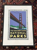 Full view of framed poster showing stylized Golden Gate Bridge and text