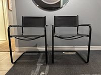 Front view of both chairs showing overall design and condition