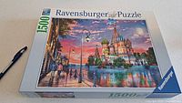 Front of Ravensburger 1500 piece puzzle box showing artwork and branding