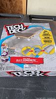 Front of sealed Tech Deck D.I.Y Concrete box showing contents illustration and branding