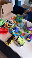 Group shot of all toddler toys spread on countertop