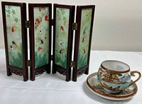 screen, cup and saucer full view