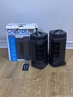 Two Blackstone Cascade Pro tower fans, remote, and original box