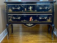Front view showing two drawers with Chinoiserie artwork and ormolu mounts