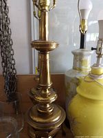 Close-up of one lamp base and lower column detailing