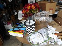 Group showing planter box, silk flowers, checkered pot, cloche, orchid stems