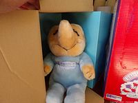 Cousin Toggle Mole plush seated inside box