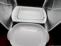 All three pans stacked showing shapes and materials