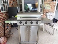 Front view of stainless Char-Broil grill closed