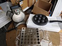 All three items together: waffle maker, jalapeno rack, 7-well pan