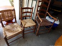Three wooden chairs side by side showing overall styles