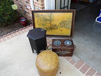 Group shot showing print, hexagonal stool, painted trunk, vinyl pouf