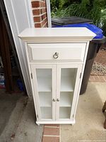 Full view of white cabinet closed