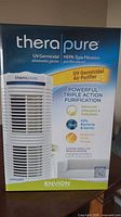 Box front showing Therapure UV Germicidal HEPA-Type Air Purifier with triple action air purification for medium rooms.