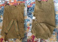 Two images showing front and back of a heavy canvas vintage Boy Scouts backpack bag with shoulder straps and a small side pocket. Shows wear and a handwritten name on the canvas.