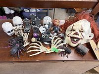 Group shot of all Halloween decorations on wooden surface