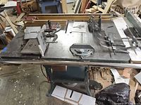 Full view of table saw top with accessories installed