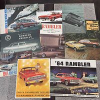 Group shot of all nine American Motors and Rambler brochures