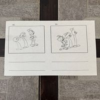 Full view of storyboard sheet showing two panels and blank caption lines