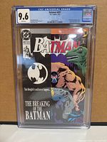 Front view of CGC-slabbed Batman #497 showing grade 9.6 and full cover art