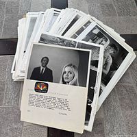 Stack of assorted 8×10 press photographs topped by NBC Color Television promo