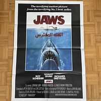 Full view of folded Jaws Egyptian poster on floor