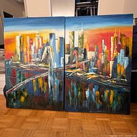 Full view of both canvases forming complete skyline scene