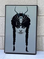 Front view of framed metal print showing full artwork