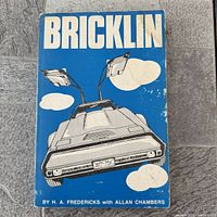 Front cover of Bricklin book showing title and car illustration