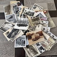 Pile view showing volume and variety of photographs