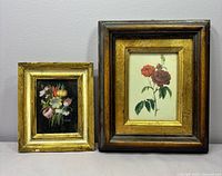 Both framed floral prints side by side