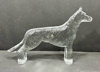Full profile of clear glass dog figurine
