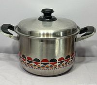 Full view of stew pot showing pattern and handles