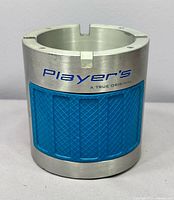 Front view showing Player's branding and blue grip