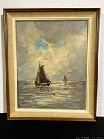 Full framed nautical oil painting showing sailing boats on water with sky background