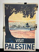 Full view of the 36x24 inch poster with clip-on acrylic protective cover showing the illustrated cityscape, tree canopy, and 'VISIT PALESTINE' text