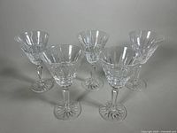 Group of five Waterford Glenmore white wine glasses arranged in a semi-circle showing the bowl and stem details.